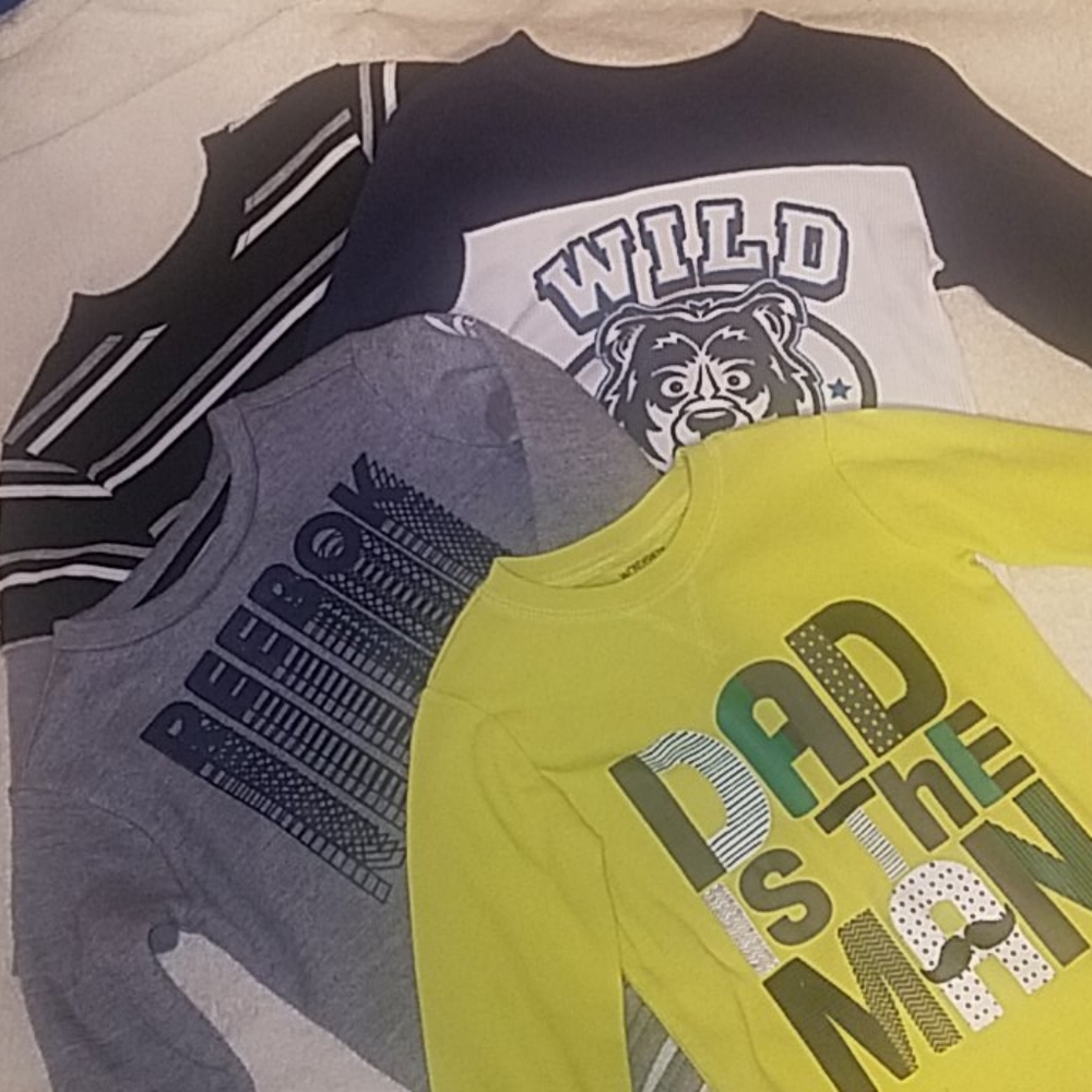 3 long sleeved t-shirt and one Reebok sweatshirt